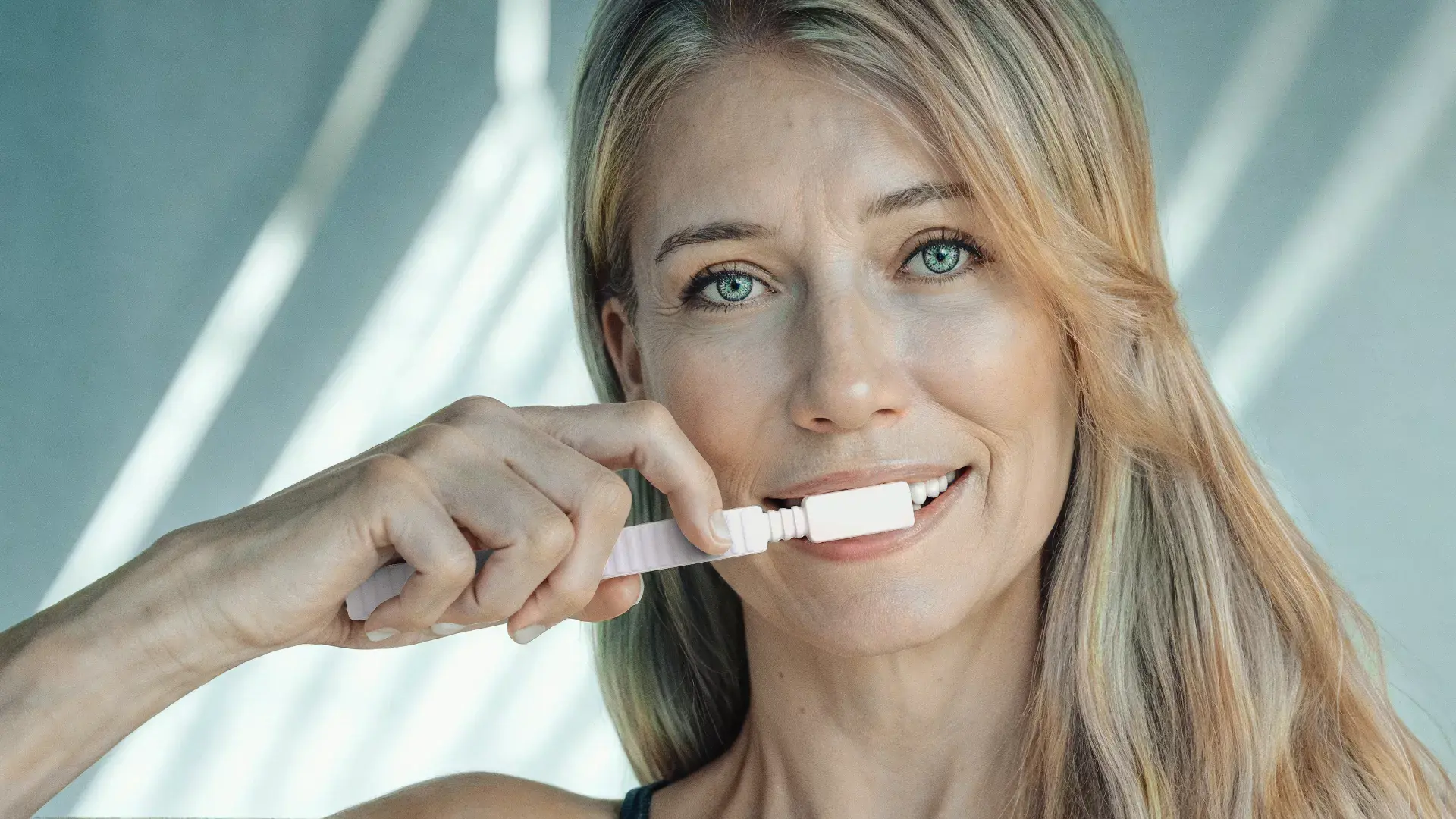 Toothbrush campaign cast with an older virtual model